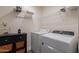 Efficient laundry area with modern washer and dryer and storage options at 7227 E Kramer St, Mesa, AZ 85207