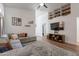 Bright living room with vaulted ceilings, built-in shelving, and comfortable seating with natural light at 7227 E Kramer St, Mesa, AZ 85207