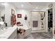 Bright bathroom features a separate shower, soaking tub, and dual sinks at 742 W Puget Ave, Phoenix, AZ 85021