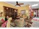 Open-concept living room with hardwood built-ins and comfortable furnishings at 742 W Puget Ave, Phoenix, AZ 85021