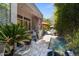 Beautiful backyard pool area with a covered patio, lush greenery, and an inviting swimming pool at 742 W Puget Ave, Phoenix, AZ 85021