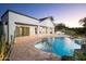 Private backyard oasis featuring a sparkling pool and ample patio space for entertaining at 7590 W Firebird Dr, Glendale, AZ 85308