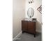 Powder room with decorative mirror and modern vessel sink and vanity at 7590 W Firebird Dr, Glendale, AZ 85308