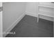 Walk-in closet has tile flooring and shelving at 7590 W Firebird Dr, Glendale, AZ 85308
