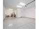 Spacious 3-car garage with epoxy flooring at 7590 W Firebird Dr, Glendale, AZ 85308