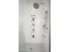 Close up of a modern shower with rainfall shower head and built-in shelving at 7590 W Firebird Dr, Glendale, AZ 85308
