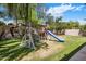 Backyard features a playset, slide, and green lawn for outdoor activities at 7758 E Nestling Way, Scottsdale, AZ 85255