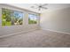 Bright bedroom with natural light from two windows at 7758 E Nestling Way, Scottsdale, AZ 85255