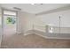 Spacious loft with carpet, neutral walls, and a hanging light fixture at 7758 E Nestling Way, Scottsdale, AZ 85255