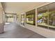 Spacious covered patio with yard, playset and multiple sliding glass door entries at 7758 E Nestling Way, Scottsdale, AZ 85255