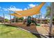 Large community playground featuring shade and a picnic area at 7758 E Nestling Way, Scottsdale, AZ 85255