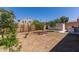 Backyard featuring a barbeque, shed and desert landscaping at 7925 S 52Nd Dr, Laveen, AZ 85339