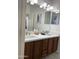 Bathroom with double vanity and bright lighting at 7925 S 52Nd Dr, Laveen, AZ 85339