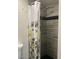 Clean bathroom shower with custom tiles and flower curtain at 7925 S 52Nd Dr, Laveen, AZ 85339