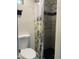 Bathroom featuring a shower stall and toilet offering a clean and functional space at 7925 S 52Nd Dr, Laveen, AZ 85339