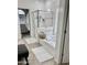 This bathroom boasts a glass-enclosed shower, soaking tub with basket, and is elegantly designed at 7925 S 52Nd Dr, Laveen, AZ 85339