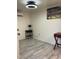 Bright bedroom featuring tile floors and a mini split AC unit at 7925 S 52Nd Dr, Laveen, AZ 85339