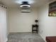 Bright bedroom with an energy-efficient split AC, a large area rug and modern lighting at 7925 S 52Nd Dr, Laveen, AZ 85339