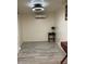 Bright bedroom featuring gray tile floors and a mini split AC unit at 7925 S 52Nd Dr, Laveen, AZ 85339