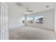 Bedroom featuring carpet and two windows at 7925 S 52Nd Dr, Laveen, AZ 85339
