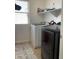 Bright laundry room featuring modern washer and dryer at 7925 S 52Nd Dr, Laveen, AZ 85339