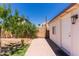 Exterior view of shed with brick trim, near the house at 7925 S 52Nd Dr, Laveen, AZ 85339