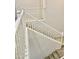 Well-lit staircase with white banister and neutral carpeting at 7925 S 52Nd Dr, Laveen, AZ 85339
