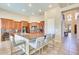 Spacious kitchen with a large island, granite countertops, and stainless steel appliances at 795 W Verbena Ln, Litchfield Park, AZ 85340