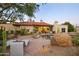 Relaxing backyard patio with lounge chairs, desert landscaping, and a view of the home at 8255 E Vista De Valle --, Scottsdale, AZ 85255