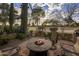 Outdoor fire pit with comfortable seating, creating a cozy and inviting atmosphere for gatherings at 8255 E Vista De Valle --, Scottsdale, AZ 85255