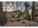 Charming single-story home featuring desert landscaping, a red tile roof, and a welcoming entrance at 8255 E Vista De Valle --, Scottsdale, AZ 85255