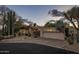Attractive single-story home with desert landscaping, an attached garage, and curb appeal at 8255 E Vista De Valle --, Scottsdale, AZ 85255