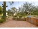 Paver patio with outdoor grill and view of lush greenery at 8255 E Vista De Valle --, Scottsdale, AZ 85255