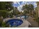 Beautiful backyard oasis with a sparkling blue pool and spa, perfect for outdoor entertaining and relaxation at 8255 E Vista De Valle --, Scottsdale, AZ 85255