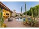 Outdoor patio with a view of the pool, desert foliage, and home exterior at 8255 E Vista De Valle --, Scottsdale, AZ 85255