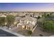 Beautiful aerial view of a well-maintained property in a residential neighborhood at twilight at 831 E Tonto Pl, Chandler, AZ 85249