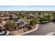 Expansive aerial view of a suburban neighborhood with well-maintained homes and lush landscaping at 831 E Tonto Pl, Chandler, AZ 85249