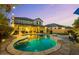Wonderful backyard featuring a sparkling pool, an outdoor kitchen and lounging area at 831 E Tonto Pl, Chandler, AZ 85249