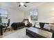 Bedroom featuring a twin bed, a futon, and a desk perfect for a teenager at 831 E Tonto Pl, Chandler, AZ 85249