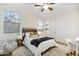 Bedroom featuring a full bed, large window, and modern decor at 831 E Tonto Pl, Chandler, AZ 85249