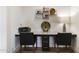 A well-lit home office area with built-in desk and stylish decor at 831 E Tonto Pl, Chandler, AZ 85249