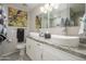 Modern bathroom with dual vessel sinks, granite counters, and decorative lighting at 8419 E Stella Ln, Scottsdale, AZ 85250
