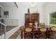Dining room with hardwood floors and wooden table and chairs at 8419 E Stella Ln, Scottsdale, AZ 85250