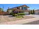 Charming two-story home with well-maintained landscaping and a spacious driveway at 8419 E Stella Ln, Scottsdale, AZ 85250