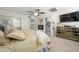Bright bedroom with fireplace and mirrored dresser at 8419 E Stella Ln, Scottsdale, AZ 85250