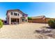 Gravel backyard with outdoor seating areas and view of the house at 8755 E Portobello Ave, Mesa, AZ 85212