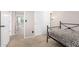 Clean bedroom with standard closet with white panel doors and carpet floors at 8755 E Portobello Ave, Mesa, AZ 85212