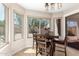 Cozy dining area with natural light and backyard views at 8755 E Portobello Ave, Mesa, AZ 85212