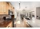 Stylish kitchen with stainless steel appliances and backyard views at 8755 E Portobello Ave, Mesa, AZ 85212