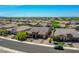Expansive aerial view of a residential neighborhood, featuring a well-maintained home at 9253 W Sands Dr, Peoria, AZ 85383